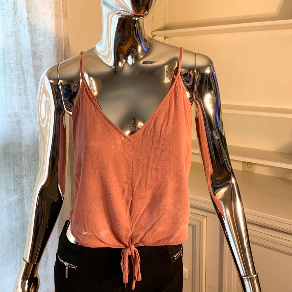 Light pink sleeveless top with front tie